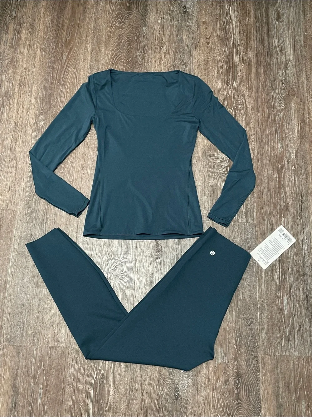 NWOT/NWT Lululemon Matching Indochine Blue Set. Size Top S/Bottom 8